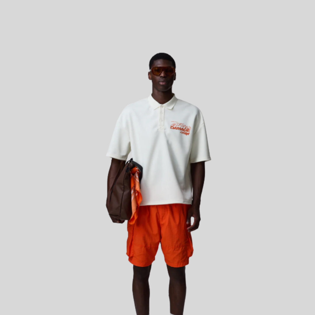 INVITATION ONLY POLO SHIRT OFF WHITE / ORANGE CRIMINAL DAMAGE